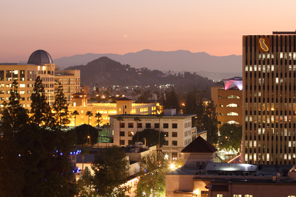 Golden-hour shot of downtown Riverside skyscrapers.